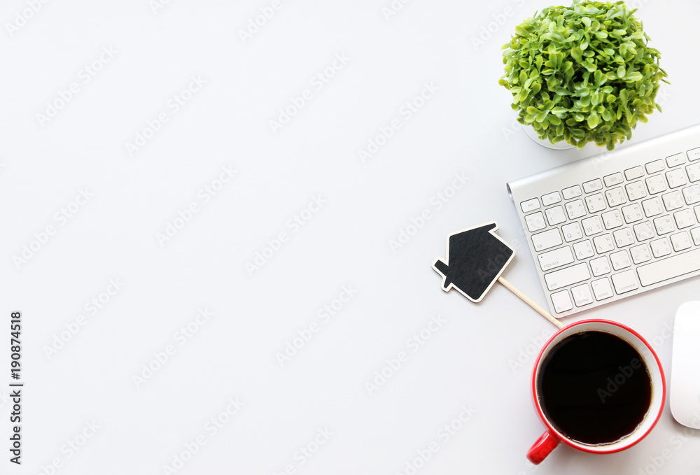 Office table with tablet,keyboard,pen,coffee cup and cactus, copy space,Top view, flat lay