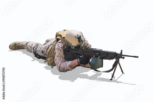 Obraz na plátně military army soldier lies prone on a firing Machine Gun M249 isolated on white