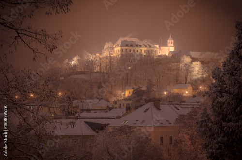 Brno winter castle at night in beautiful soft lighting covered in snow