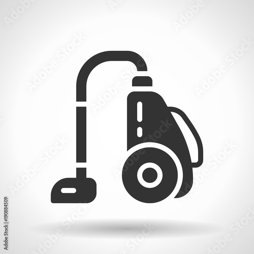 Monochromatic vacuum cleaner icon with hovering effect shadow on grey gradient background. EPS 10