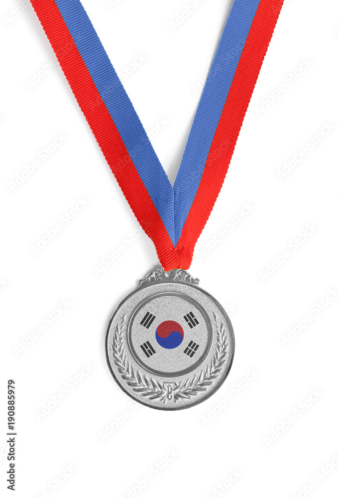 Silver medal on white as a symbol of victory in sports competition in South Korea Silver medal on white as a symbol of victory in sports competition in South Korea