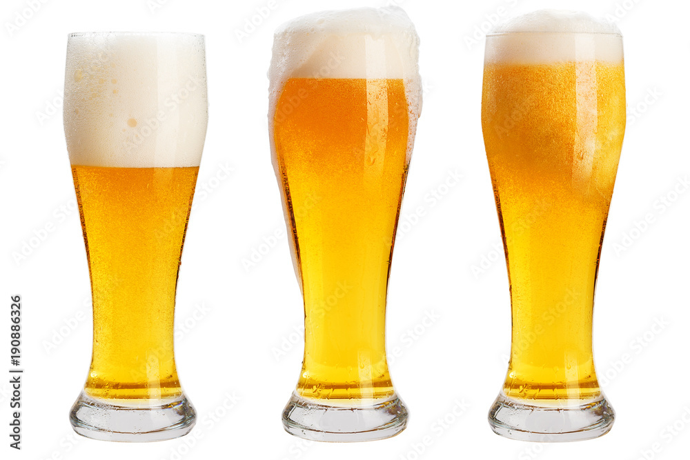 Glass of cold beer with foam, clipping path, bubbles in a drink, on a white background, isolated Glass of cold beer with foam, clipping path, bubbles in a drink, on a white background, isolated