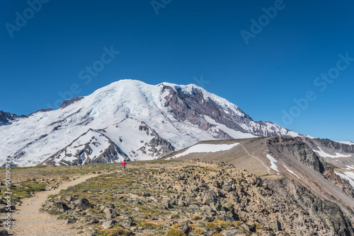 Woman Hikes Burroughs Mountain Trail photo