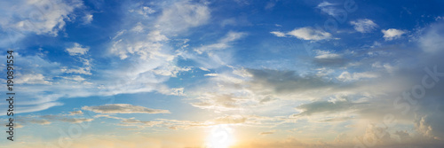 Vibrant color of sun set sky with cloud, panoramic image. © tanarch