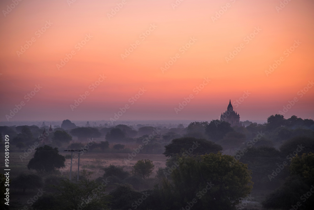 Beautiful landscape view of sunset Pagoda in Bagan city, Myanmar. Landmark and famous of romantic place of travel
