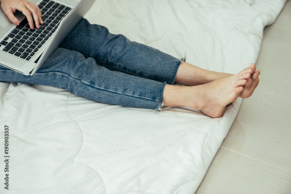 Naklejka premium Young asian girl is freelancer with her private business at home office, working with laptop, coffee, online marketing. Young woman startup her SME business.