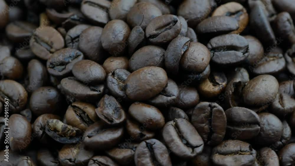 Stack of roast coffee beans. Close up of coffee beans concept Stack of roast coffee beans. Close up of coffee beans concept