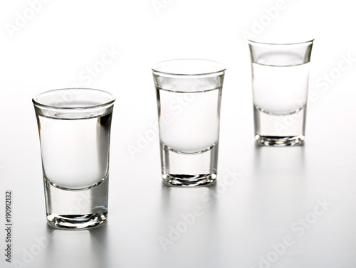 Slika na platnu German hard liquor Korn Schnapps in shot glasses