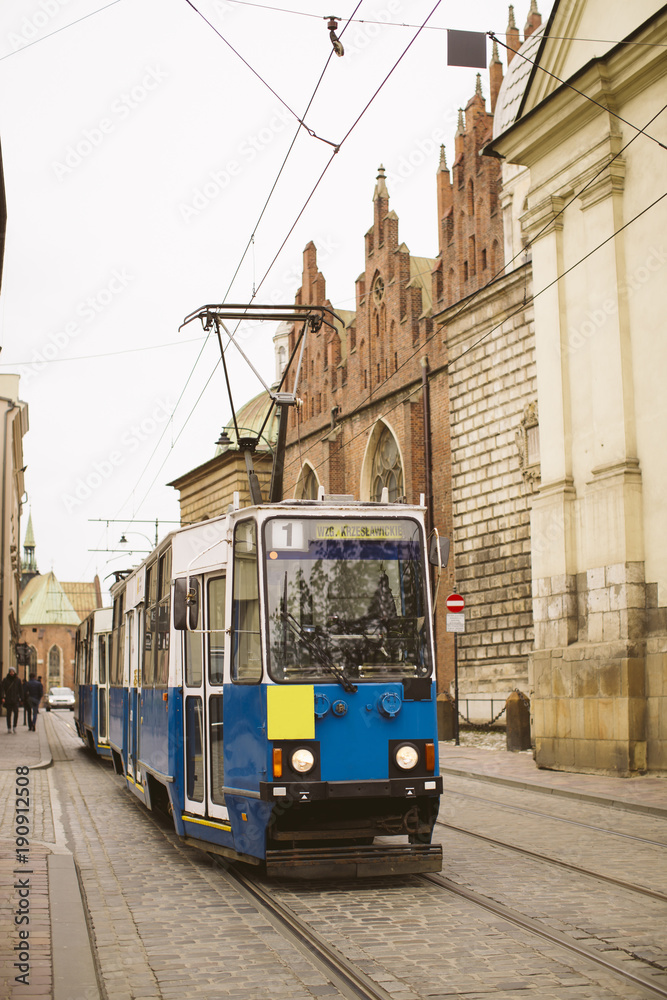 Running trams in the city center of Krakow, Poland Running trams in the city center of Krakow, Poland