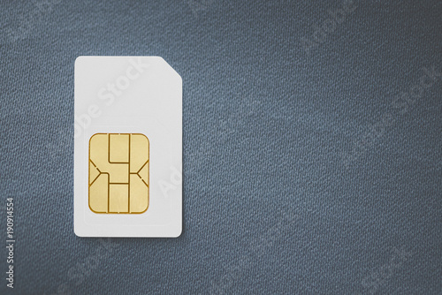 Close up of multiple sim card on fabric background