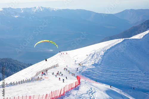 paraplane over the ski slope photo