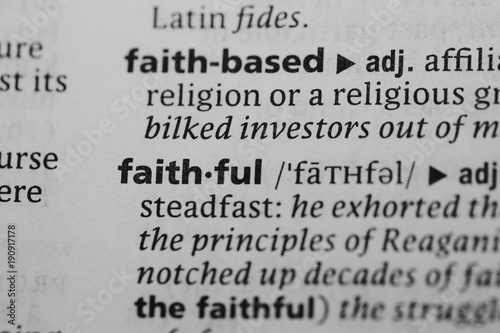 Macro shot of word definition: faithful