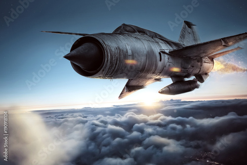 Kampfflugzeug über den Wolken photo