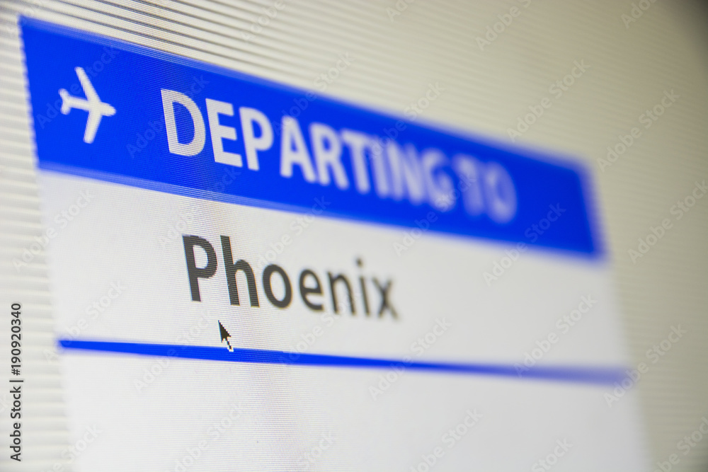 Computer screen close-up of status of flight departing to Phoenix, Arizona, USA Computer screen close-up of status of flight departing to Phoenix, Arizona, USA