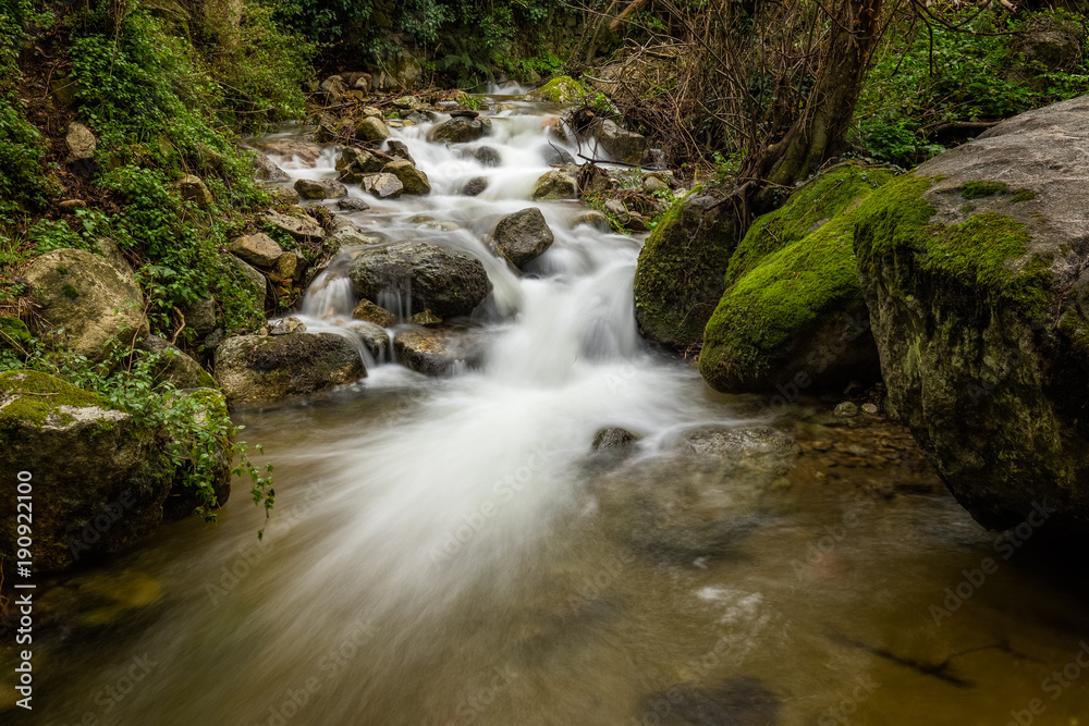 Slow shutter image of cascading mountain stream in Corsica Slow shutter image of cascading mountain stream in Corsica