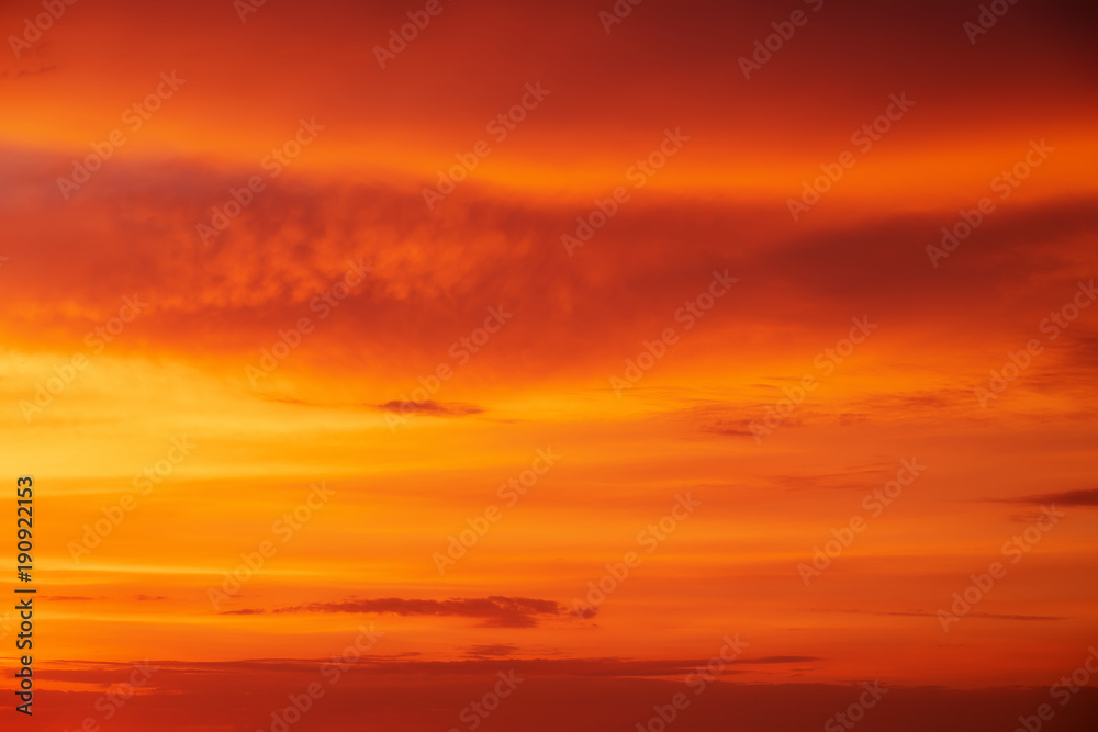 Beautiful fiery orange sunset sky as background