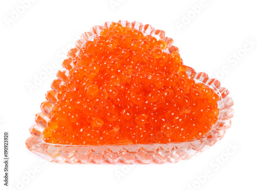 Red caviar isolated on a white background. Macro.