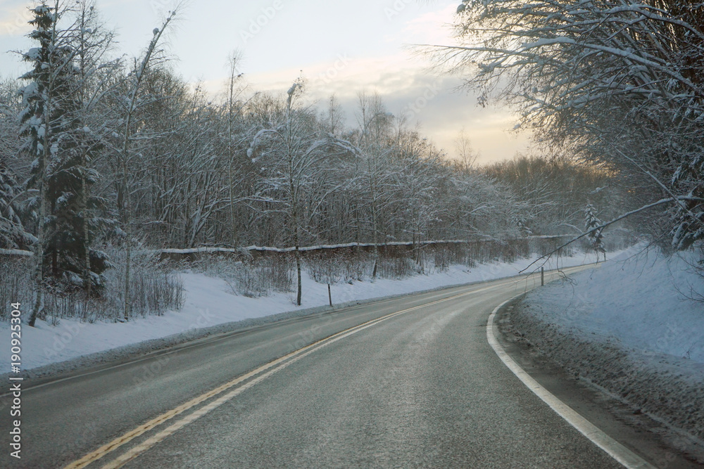 Cleaned winter asphalt road.