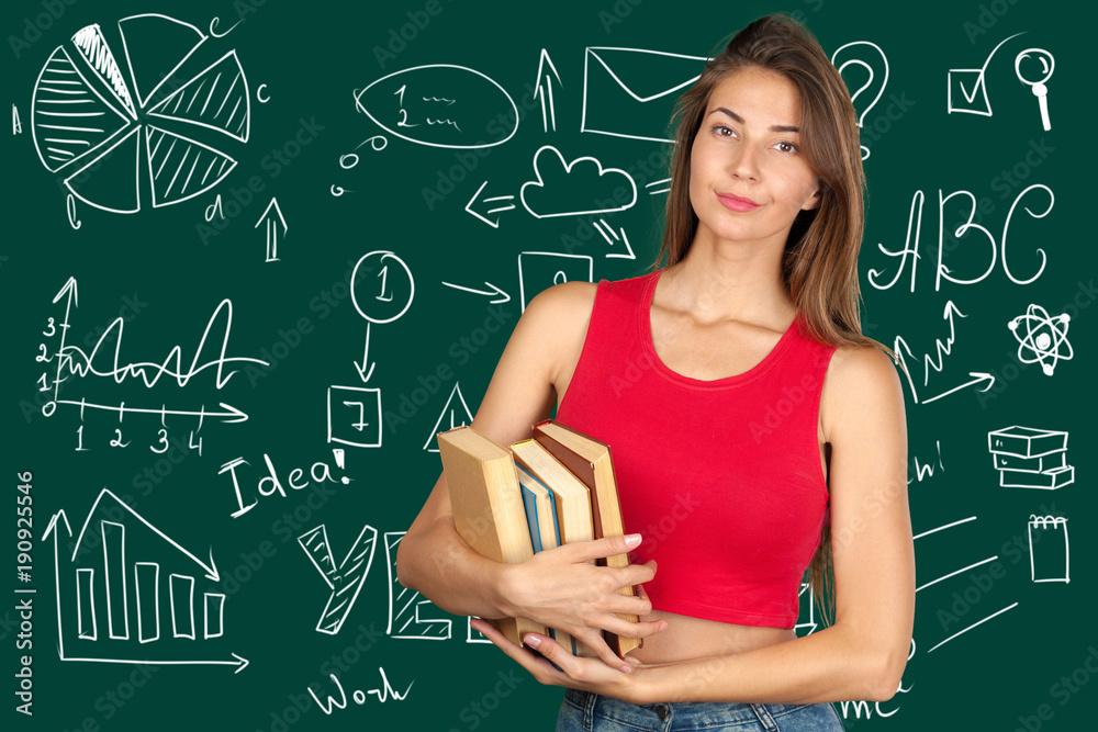 © fotofabrika - Young woman with a books pile