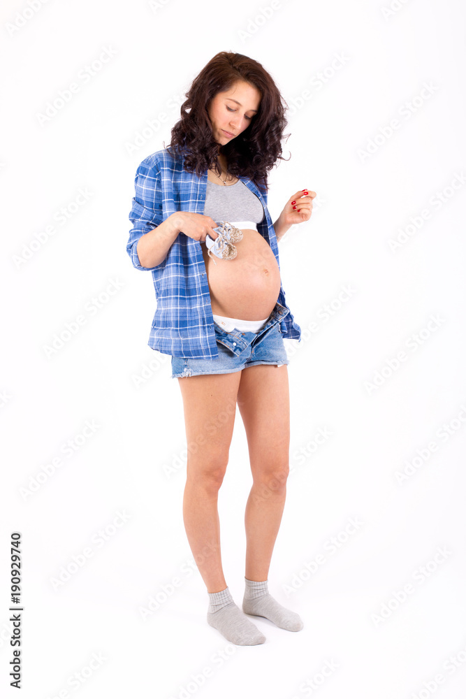 Beautiful pregnant girl on white background Beautiful pregnant girl on white background