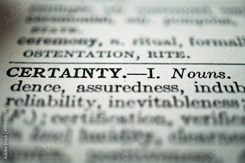 closeup of the word certainty in the dictionary photo