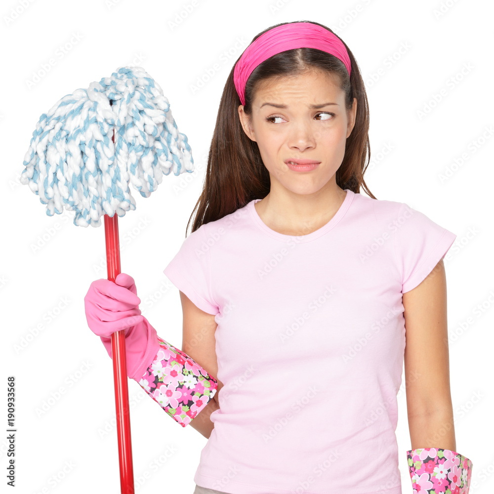 Funny cleaning girl unhappy with chores during spring cleaning at home.  Housewife or cleaning lady maid Asian girl looking at mop unmotivated to  clean, isolated on white background. Stock Photo | Adobe