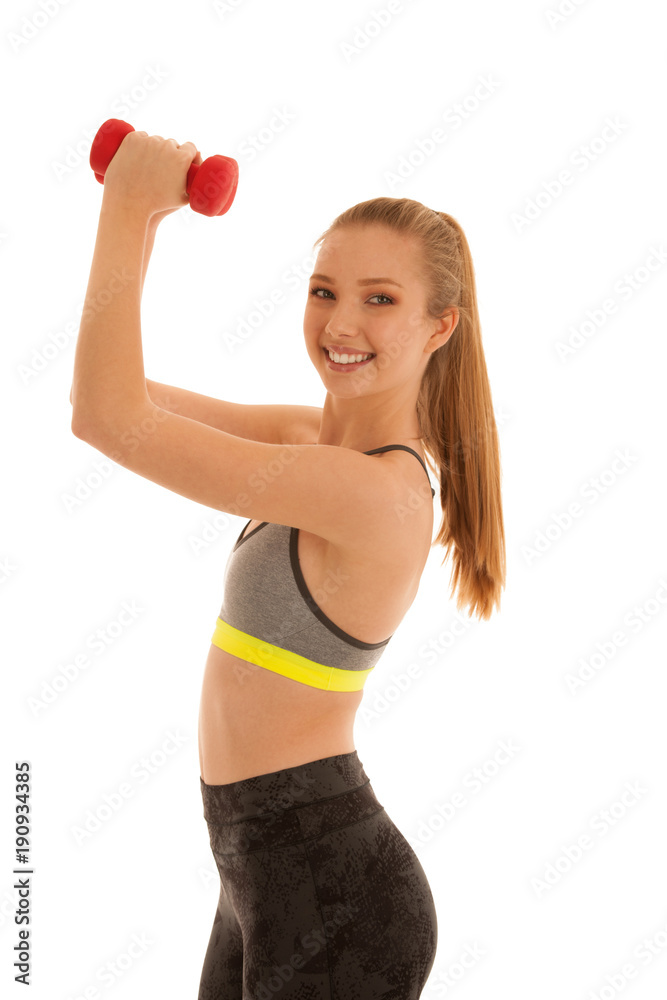 Beautiful young fit woman works out with dumbbells isolated over white background Beautiful young fit woman works out with dumbbells isolated over white background
