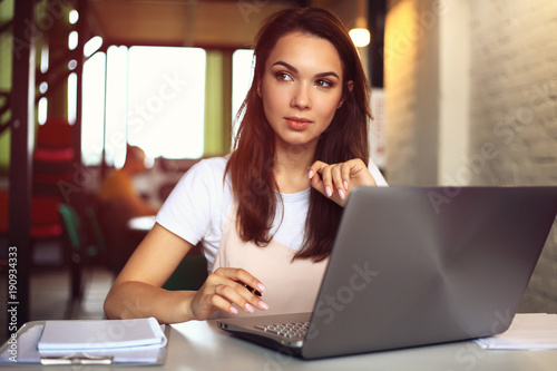 Hipster Woman use Laptop huge Loft Studio.Student Researching Process Work.Young Business Team Working Creative Startup modern Office.Analyze market stock,new strategy