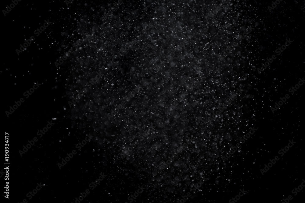 The texture of the snow on a black background