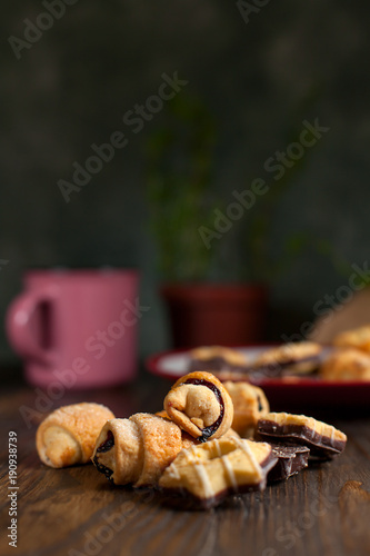 biscuits with berry stuffing on a dark wooden table