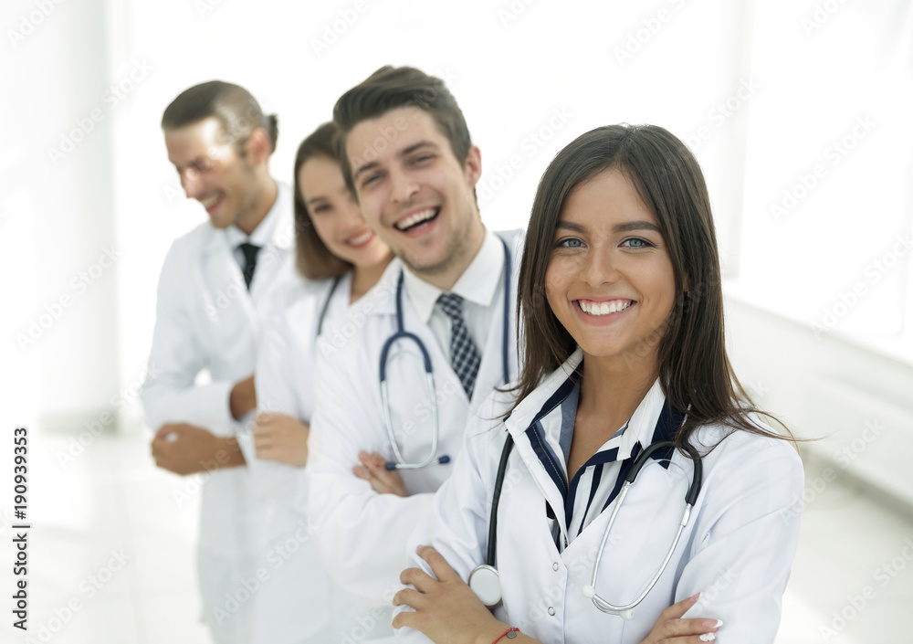 female doctor with group of happy successful colleagues female doctor with group of happy successful colleagues