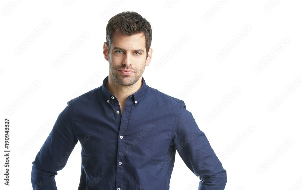 Confident young professional man portrait. Smiling young businessman standing at isolated white background and looking at camera. Confident young professional man portrait. Smiling young businessman standing at isolated white background and looking at camera.