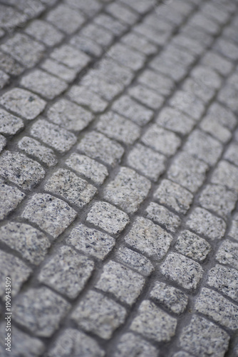 grey stone wall texture background selective focus