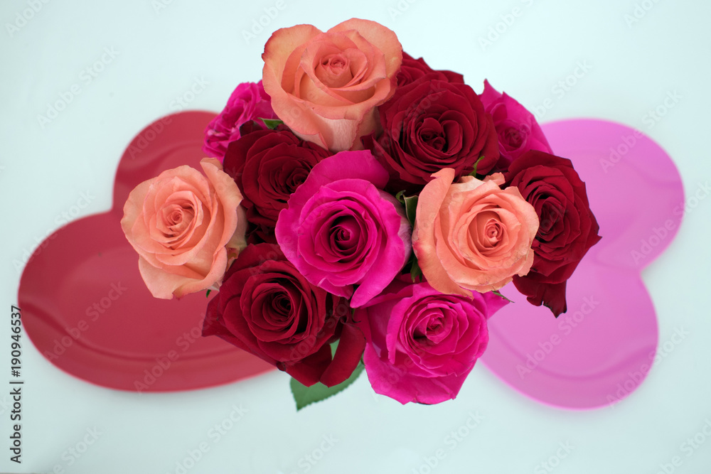 Bouquet of roses between two heart shaped plates Bouquet of roses between two heart shaped plates