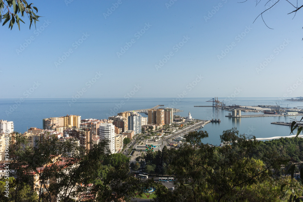 City skyline of Malaga overlooking the sea ocean in Malaga, Spain, Europe on a bright summer day