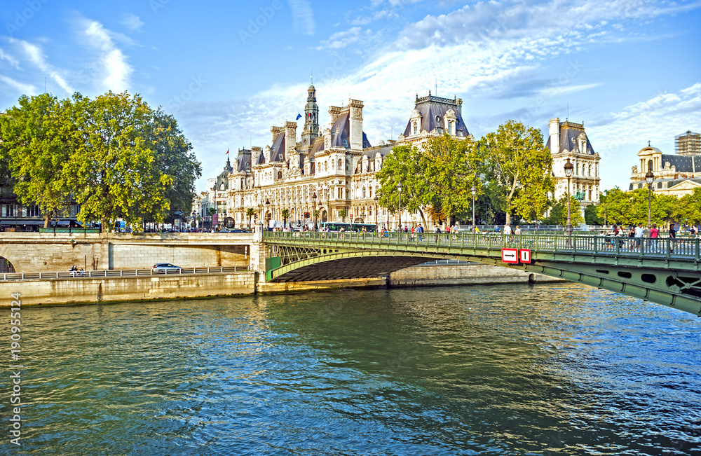Paris, France - August 28, 2014: View of the Hotel de Ville in Paris, the city administration building, across the Seine River