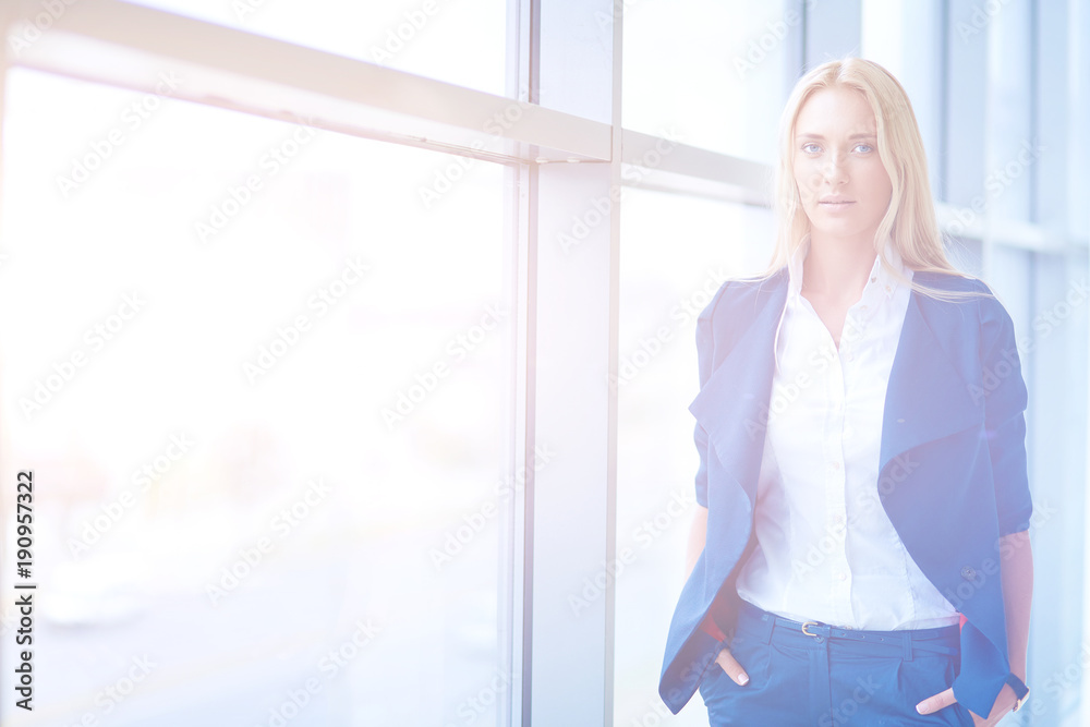 Yound woman drink coffee at office, standing. Yound woman Yound woman drink coffee at office, standing. Yound woman
