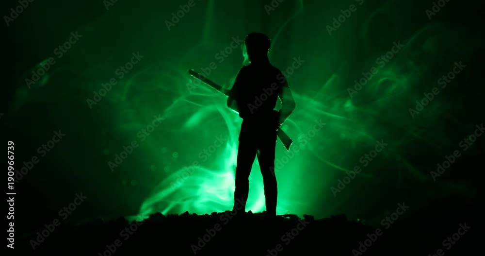 Soldier With Riffle Shadow Man with riffle at night with light rotating, or War Concept. Military ...