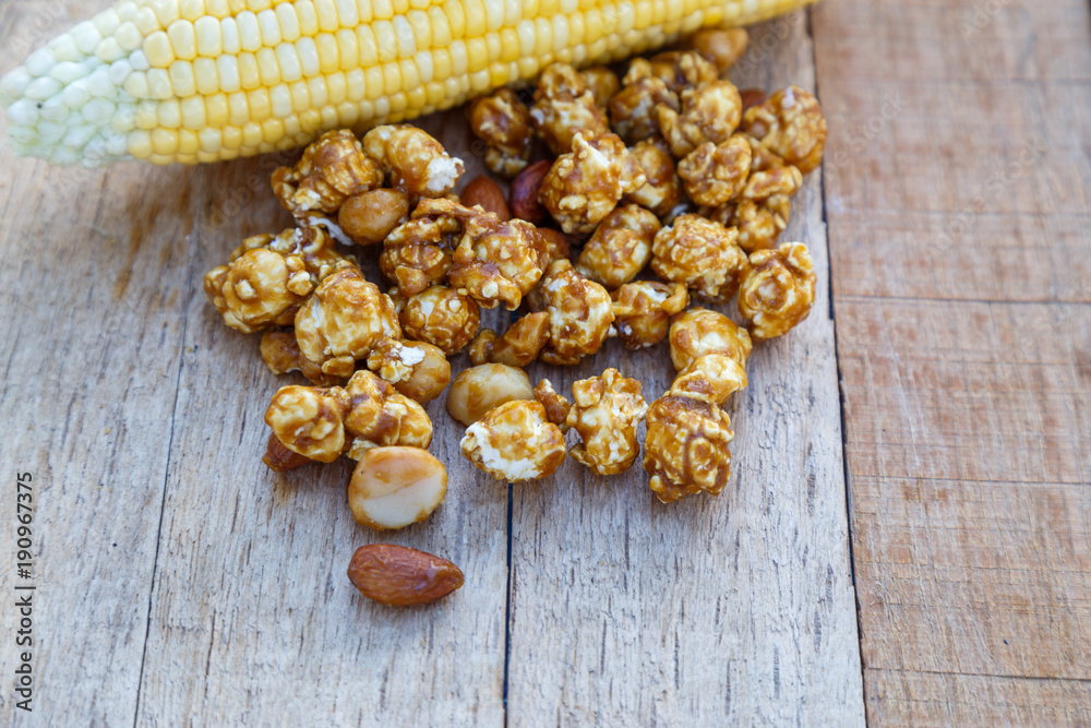 Fototapeta premium Popcorn caramel mix macadamia and almond taste