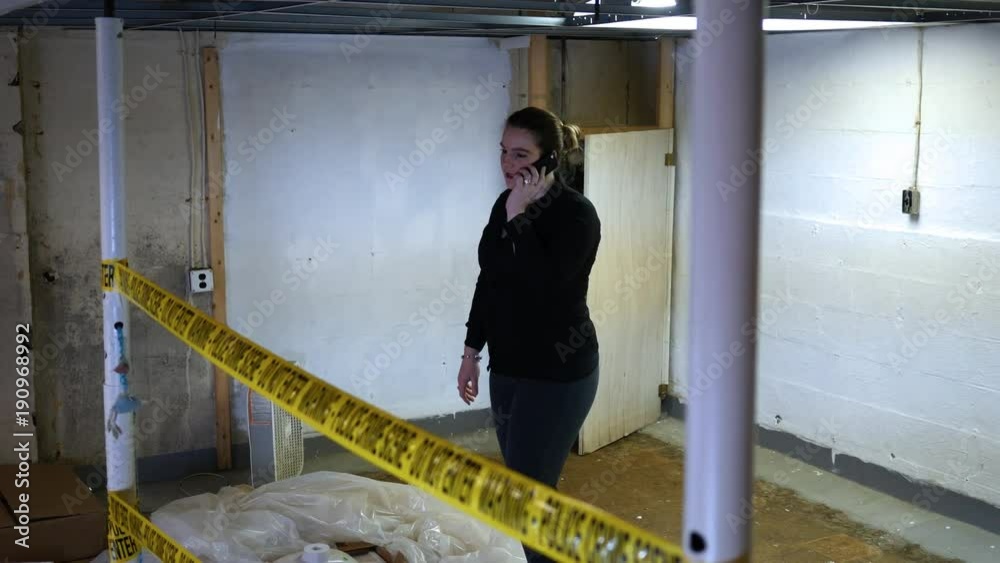 Female undercover police officer making 911 call at murder scene Female undercover police officer making 911 call at murder scene