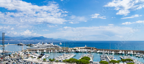 Panorama from port of Antibes with mountain coast in background