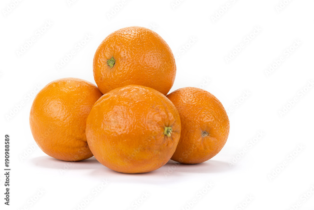 Fresh juicy oranges with halves on the white background Fresh juicy oranges with halves on the white background