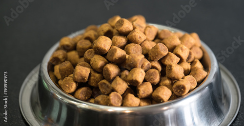 Fototapeta Naklejka Na Ścianę i Meble -  Dry dog treats in bowl