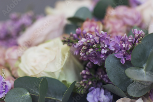 Lilac and eucalyptus in a large delicate bouquet