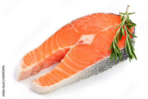 Slice of red fish salmon with a sprig of rosemary isolated on white background