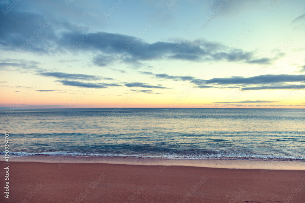 Beautiful seascape, sunset by the ocean, with retro toning Beautiful seascape, sunset by the ocean, with retro toning