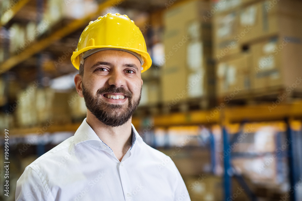 Portrait of a male warehouse worker or supervisor. Portrait of a male warehouse worker or supervisor.