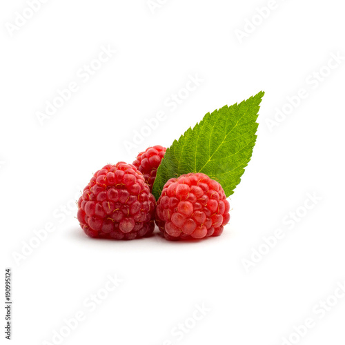 Photo of fresh red raspberry with leaves isolated on white background