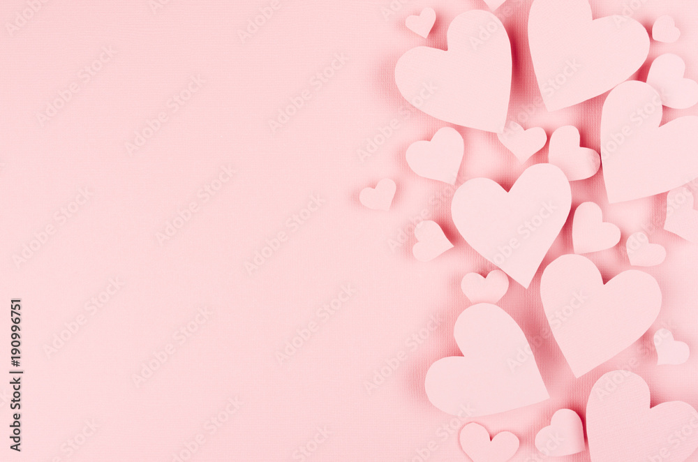Paper pink hearts fly on soft pink color background, border, copy space. Valentine day concept for design. - obrazy, fototapety, plakaty 