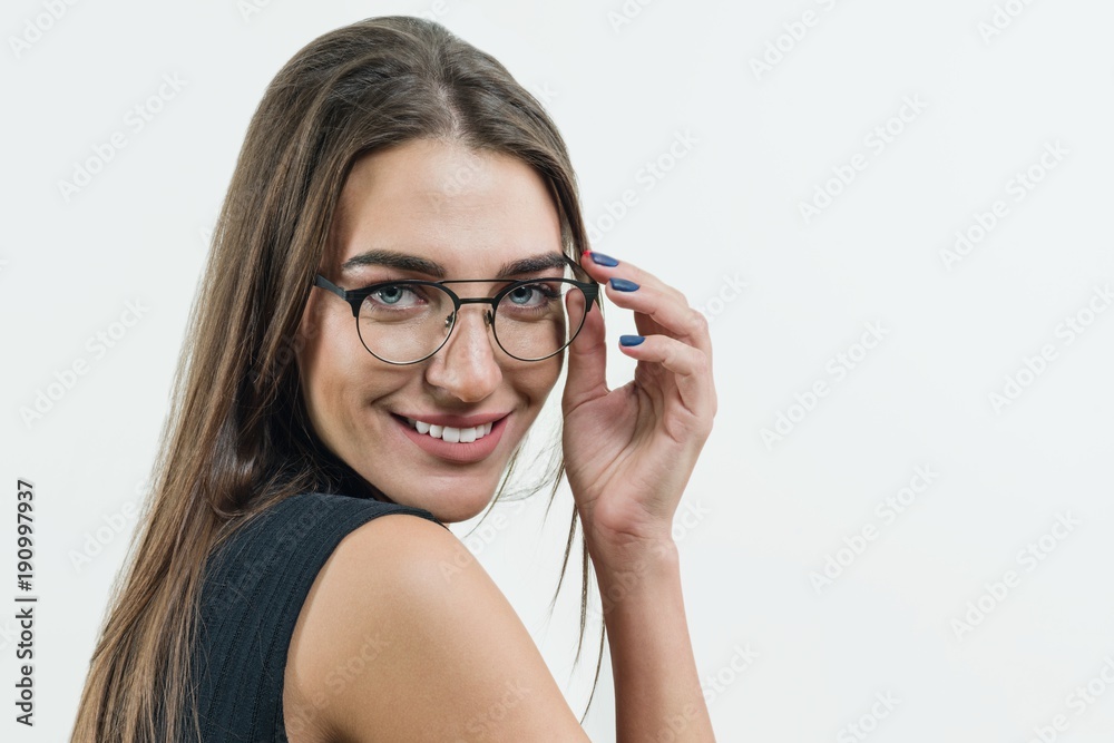 Attractive female teacher, businesswoman, wearing glasses